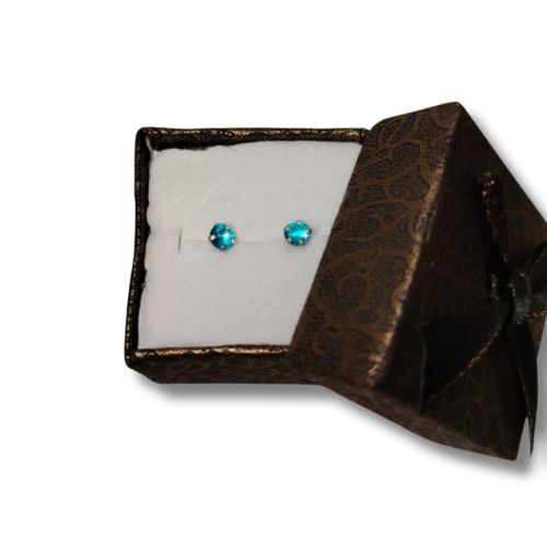 Arete broquel de plata con circonia circular azul