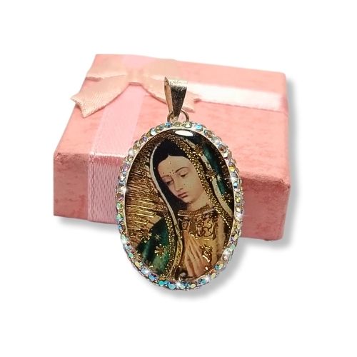 Dije encapsulado de la virgencita doble vista