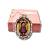 Dije encapsulado de la virgencita doble vista