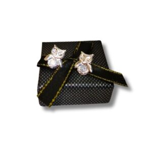 Broquel en forma de búho con circonia en el centro