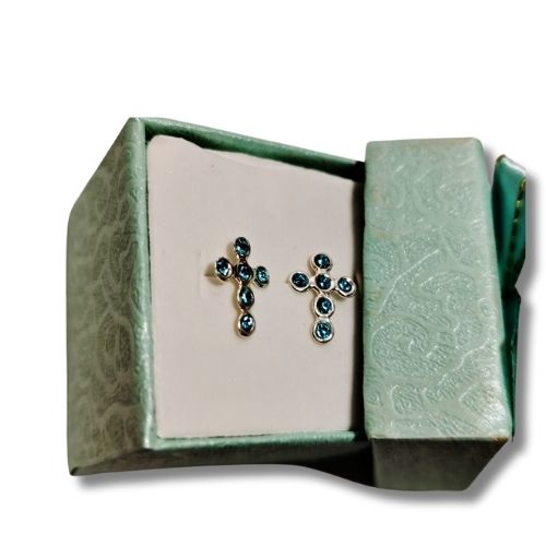 Broquel cruz con circonias azules