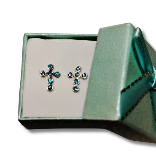 Broquel cruz con circonias azules